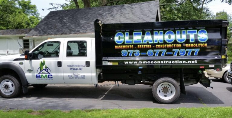 Dump truck and body lettering for BMC Construction cleanouts, by Lombardo Lettering, New Jersey