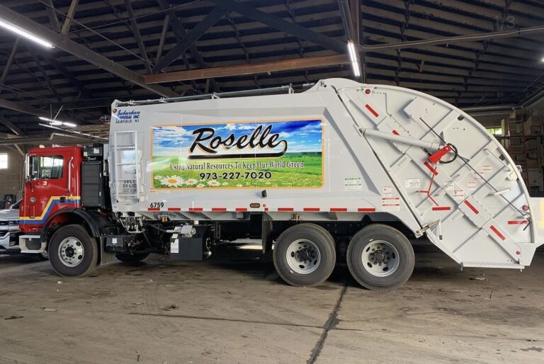 Printed garbage truck graphics for Roselle, by Lombardo Lettering, New Jersey