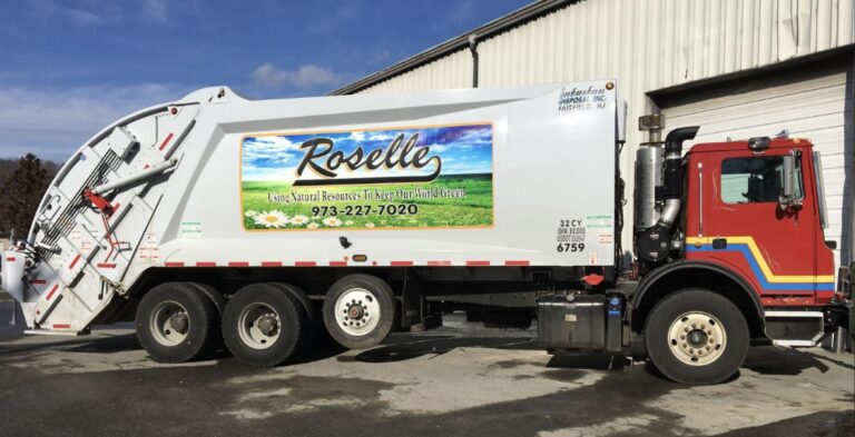 Printed garbage truck graphics for Roselle, by Lombardo Lettering, New Jersey
