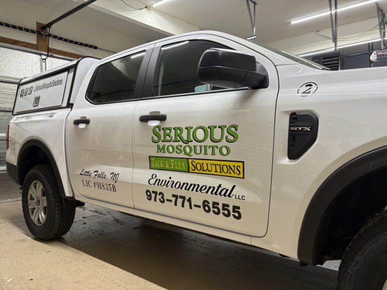 Pickup truck door lettering with license number for Serious Mosquito Environmental, Little Falls NJ, by Lombardo Lettering